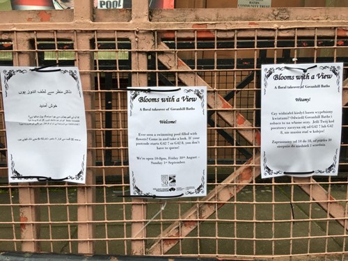 Signs outside the Baths in Polish and Urdu