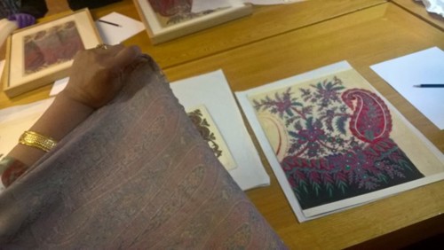 A member of the Glendale Women's cafe shows off her Paisley pattern / Kashmir shawl